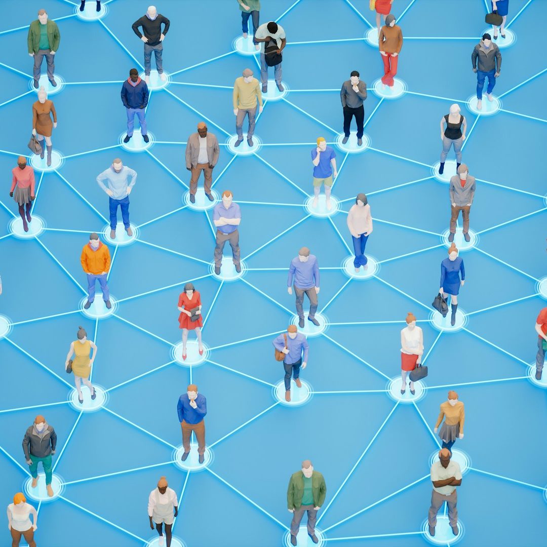 People standing and interacting in a networked space with visible connections.