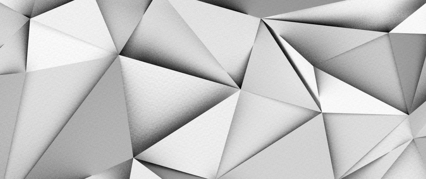Abstract geometric pattern with white and light gray triangular shapes.