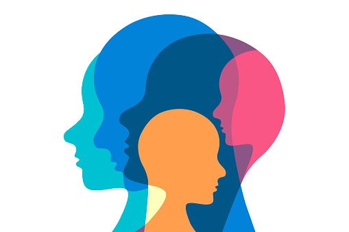 Silhouettes of human profiles in various colors overlapping each other.